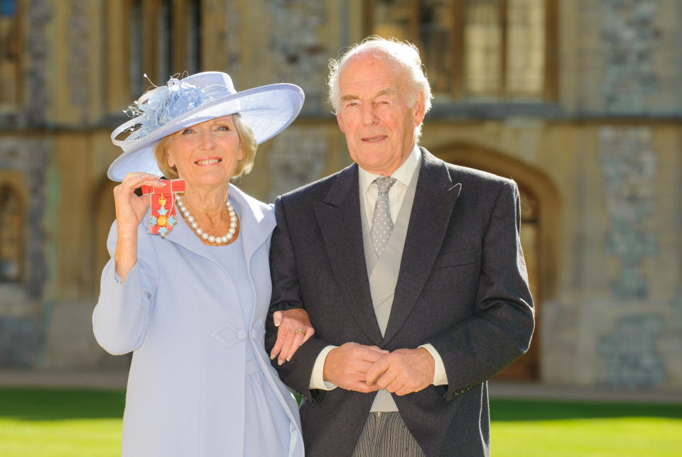 WINDSOR, ENGLAND - OCTOBER 12:  Mary Berry, poses with her husband Paul Hunnings, after becoming a Commander of the British Empire (CBE) from the Prince of Wales during an Investiture ceremony at Windsor Castle on October 12, 2012 in Windsor, England.  (Photo by Dominic Lipinski-WPA Pool/Getty Images)