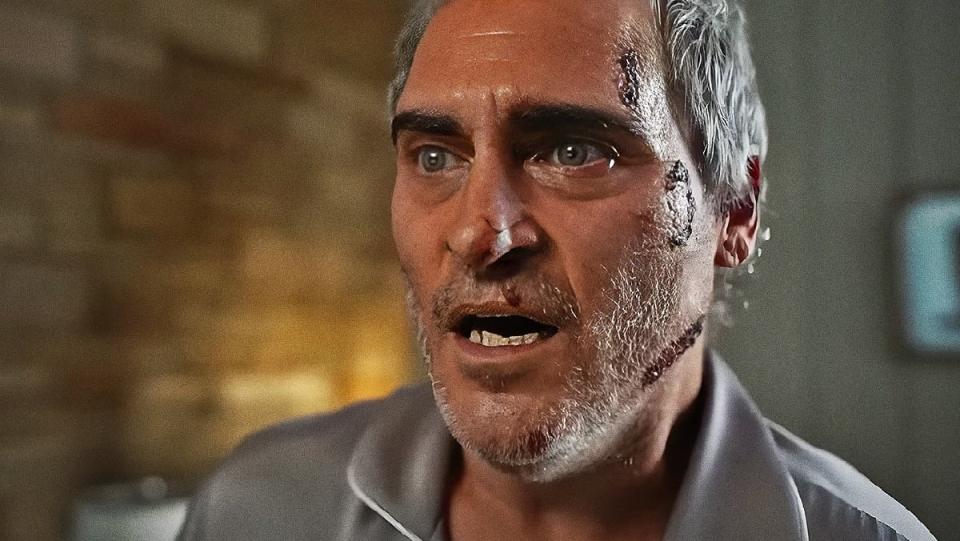 Joaquin Phoenix looks upset and beaten up, a regular occurrence, in Beau Is Afraid.