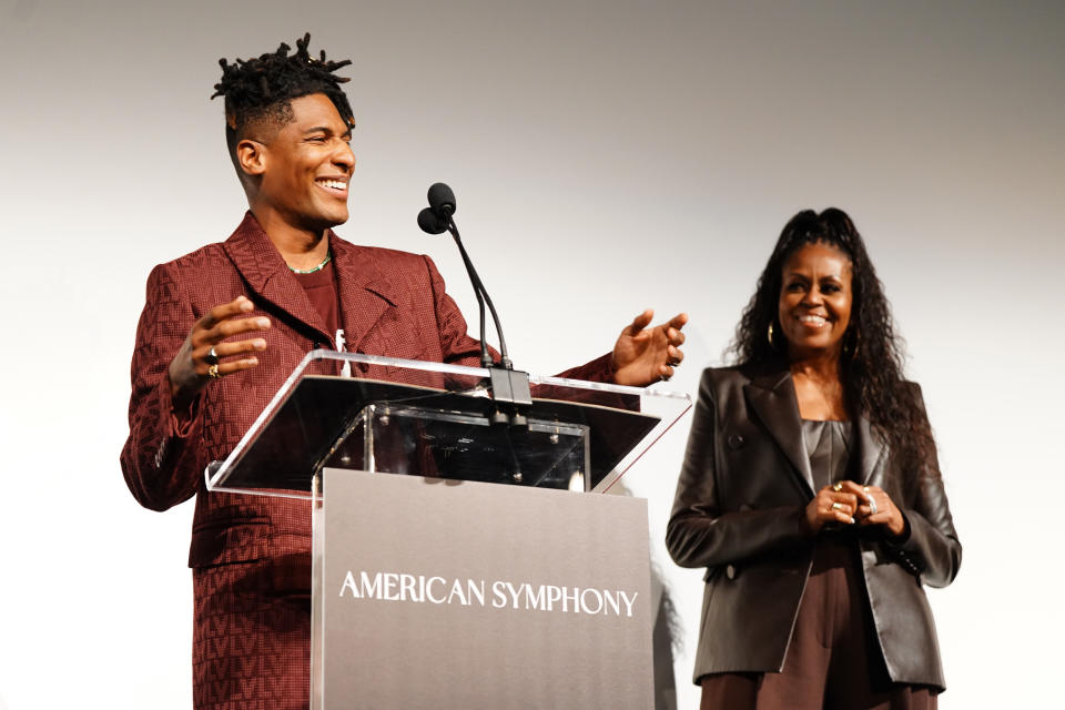 Jon Batiste and Michelle Obama attend the 'American Symphony' New Orleans premiere on December 07, 2023 in New Orleans, Louisiana.