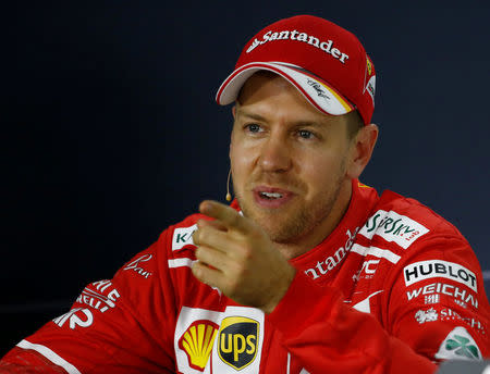 Formula One - F1 - Australian Grand Prix - Melbourne, Australia - 25/03/2017 Ferrari driver Sebastian Vettel of Germany speaks at the post-qualifying press conference. REUTERS/Brandon Malone