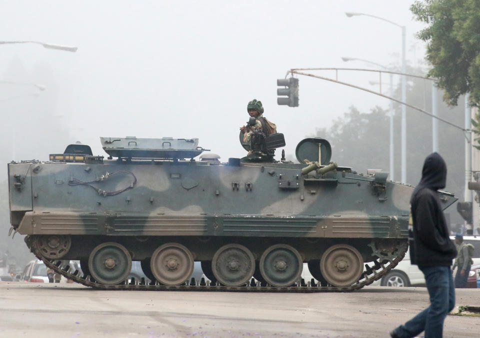 Military vehicles and soldiers patrol the streets in Harare&nbsp;on Nov. 15. (Photo: Philimon Bulawayo / Reuters)