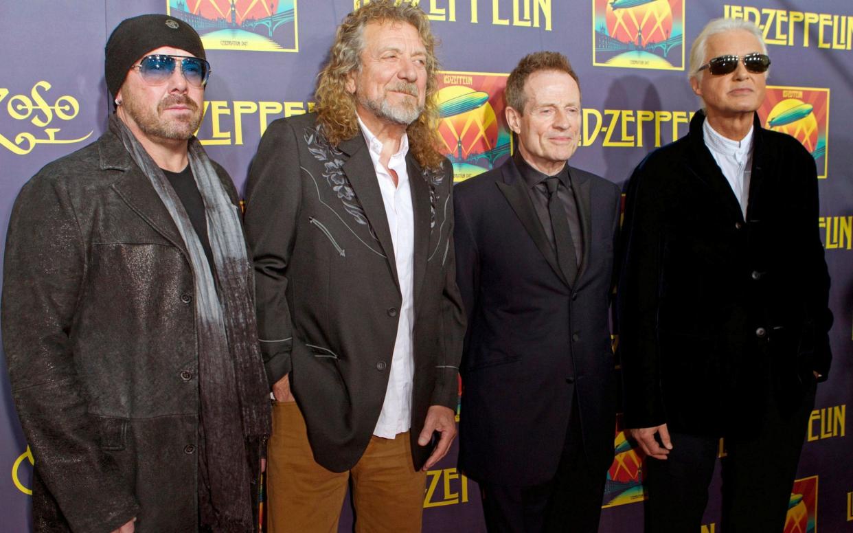 John Paul Jones, Robert Plant, Jimmy Page, and Jason Bonham - AP