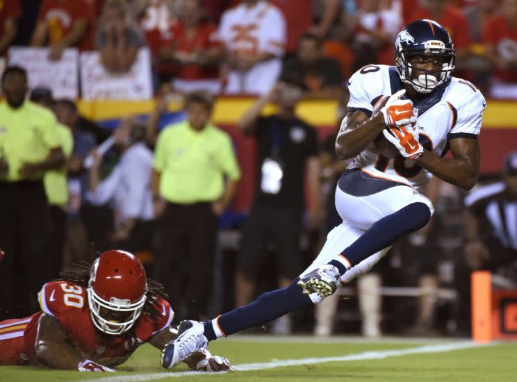 Emmanuel Sanders scoring against the Chiefs last season (AP)