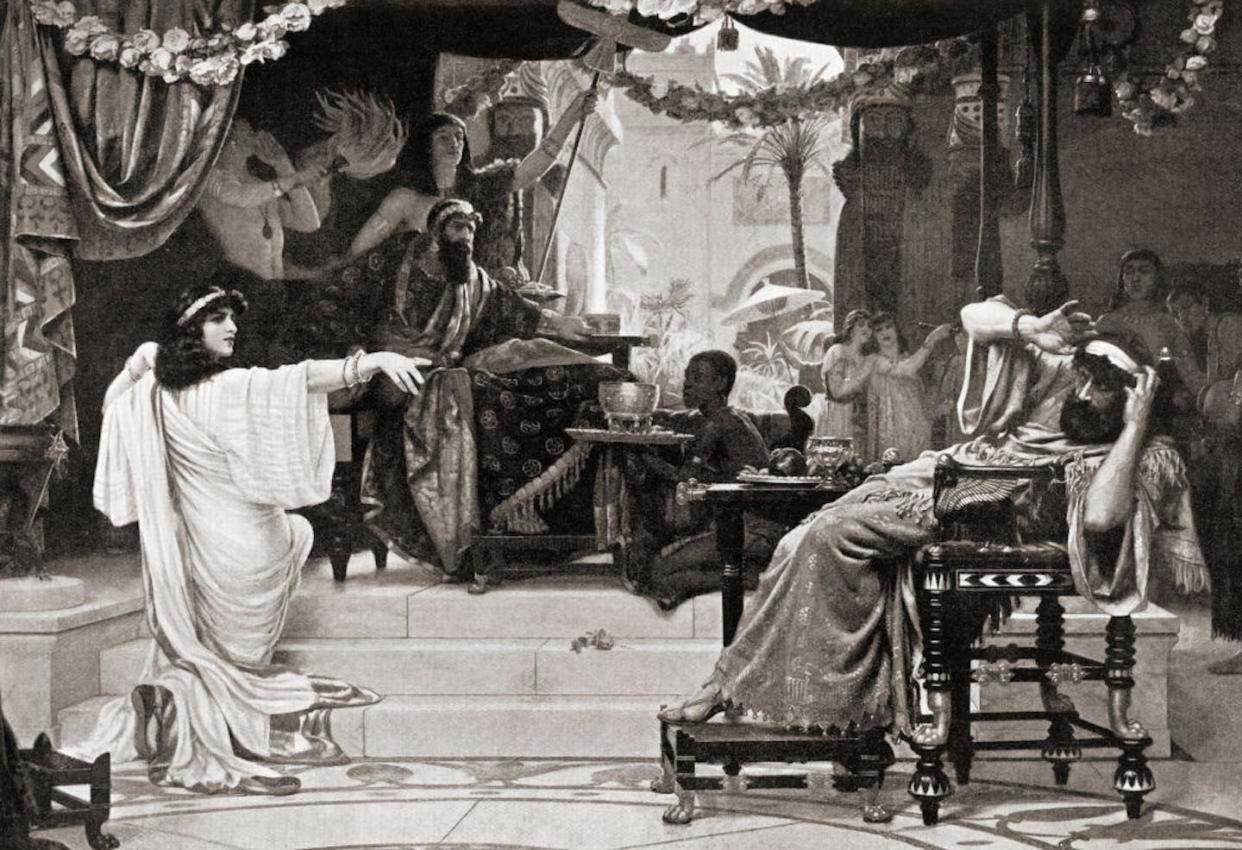 Esther denouncing Haman, who, according to the Purim story, attempted to have all Jews within the Persian Empire massacred. <a href="https://www.gettyimages.com/detail/news-photo/esther-denouncing-haman-haman-a-favourite-at-the-court-of-news-photo/929217364?adppopup=true" rel="nofollow noopener" target="_blank" data-ylk="slk:Hutchinson's History of the Nations/Universal History Archive/Universal Images Group via Getty Images;elm:context_link;itc:0;sec:content-canvas" class="link ">Hutchinson's History of the Nations/Universal History Archive/Universal Images Group via Getty Images</a>