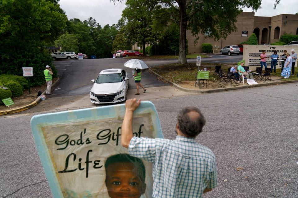 Anti-abortion protesters outside a Planned Parenthood clinic in South Carolina (Copyright 2022 The Associated Press. All rights reserved.)
