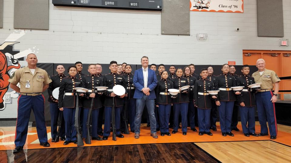 U.S. Rep. Ronny Jackson stands with the national champion Marine JROTC Caprock drill team Friday at Caprock High School Gym.