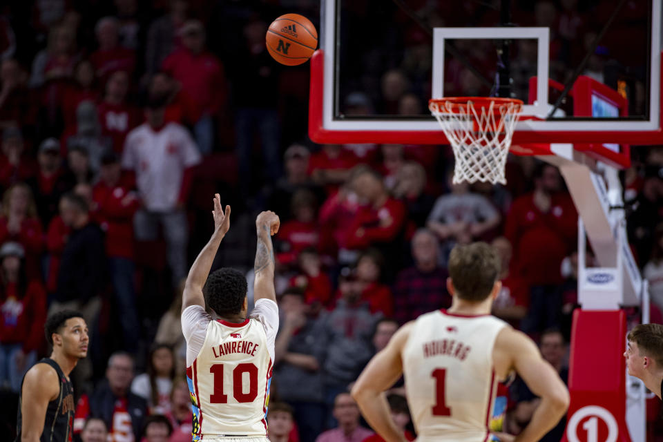 Nebraska's Jamarques Lawrence (10) makes a free throw against Wisconsin in overtime during an NCAA college basketball game Saturday, Feb. 11, 2023, in Lincoln, Neb. (AP Photo/John Peterson)