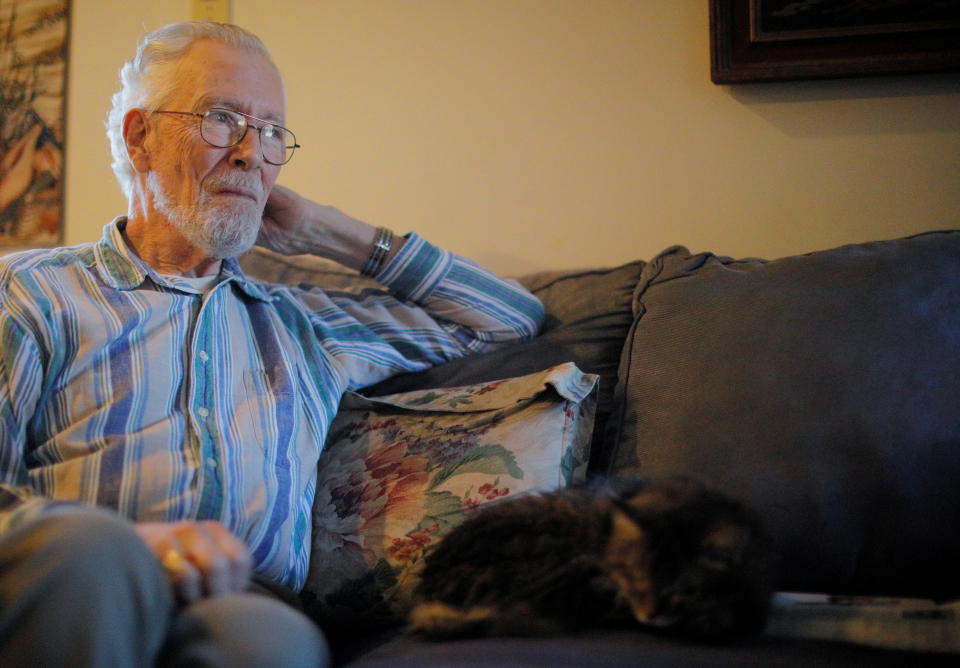 Charles Flagg, who took part in an early stage trial of Biogen's drug Aducanumab following his diagnosis with Alzheimer's disease, sits in his home in Jamestown, Rhode Island, U.S., February 21, 2020. On June 7, 2021 the U.S. Food and Drug Administration (FDA) approved Aduhelm (aducanumab) as the first treatment to target a likely underlying cause of Alzheimer's disease - sticky deposits of a protein called amyloid beta. Picture taken February 21, 2020. REUTERS/Brian Snyder