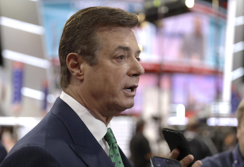 FILE - In this July 17, 2016, file photo, then-Donald Trump campaign chairman Paul Manafort talks to reporters on the floor of the Republican National Convention in Cleveland. A firm headed by Manafort received more than $1.2 million in payments that correspond to entries in a handwritten ledger tied to a pro-Russian political party in Ukraine, according to financial records obtained by The Associated Press. The payments between 2007 and 2009 are the first evidence that Manafort’s consulting firm received funds listed in the so-called Black Ledger, which Ukrainian investigators have been investigating as evidence of off-the-books payments from the Ukrainian Party of Regions. (AP Photo/Matt Rourke, File)