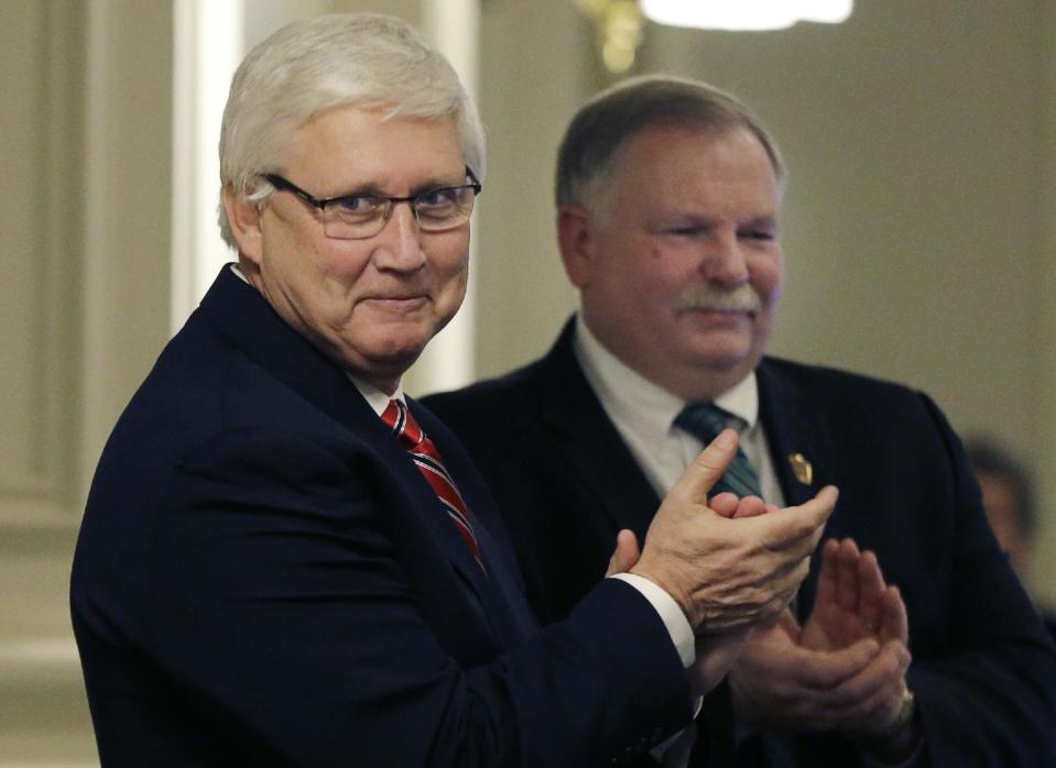 New Hampshire Senate President Chuck Morse, left, joins House Speaker Shawn Jasper as he presides over the opening session in the House Chamber at the Statehouse, Wednesday, Jan. 4, 2017, in Concord, N.H. For two days only, Senate President Morse is New Hampshire's governor. The Republican landed in the state's top job due to a unique political time, with Maggie Hassan resigning to become a U.S. Senator two days before Republican Gov.-elect Chris Sununu is officially sworn in. (AP Photo/Elise Amendola)