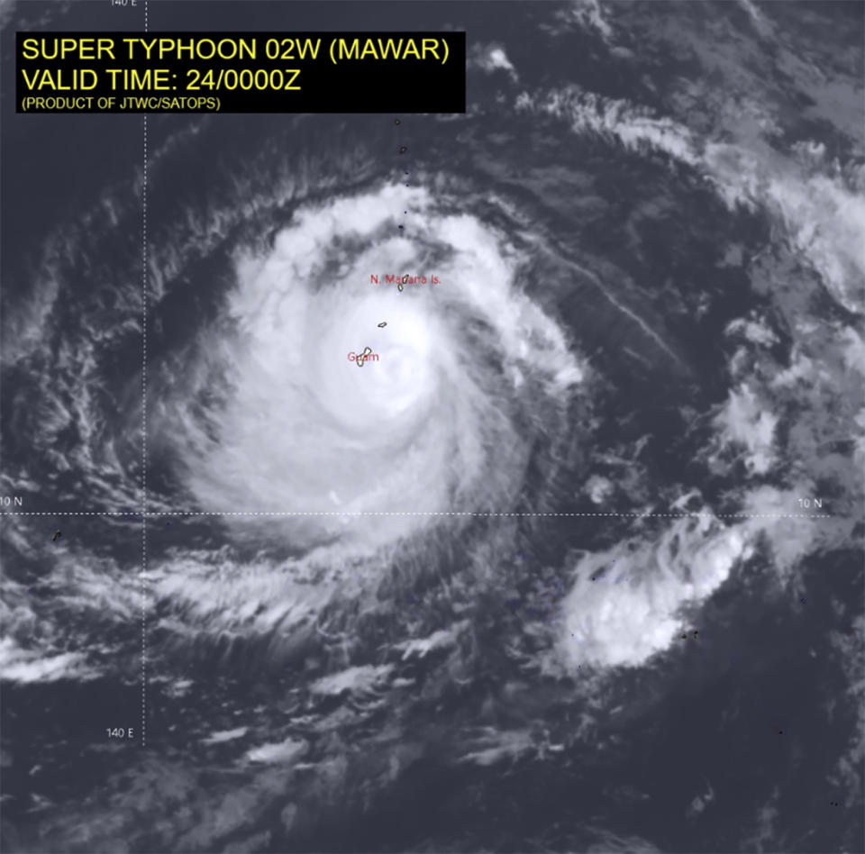 This infrared satellite image from the Joint Typhoon Warning Center shows Typhoon Mawar as it approached Guam on Wednesday, May 24, 2023. Typhoon Mawar aimed its fury at the tiny U.S. territory of Guam on Wednesday as residents with nowhere to go hunkered down to face devastating winds and torrential rains from what was expected to be the worst storm to hit the Pacific island in decades. (Joint Typhoon Warning Center via AP)