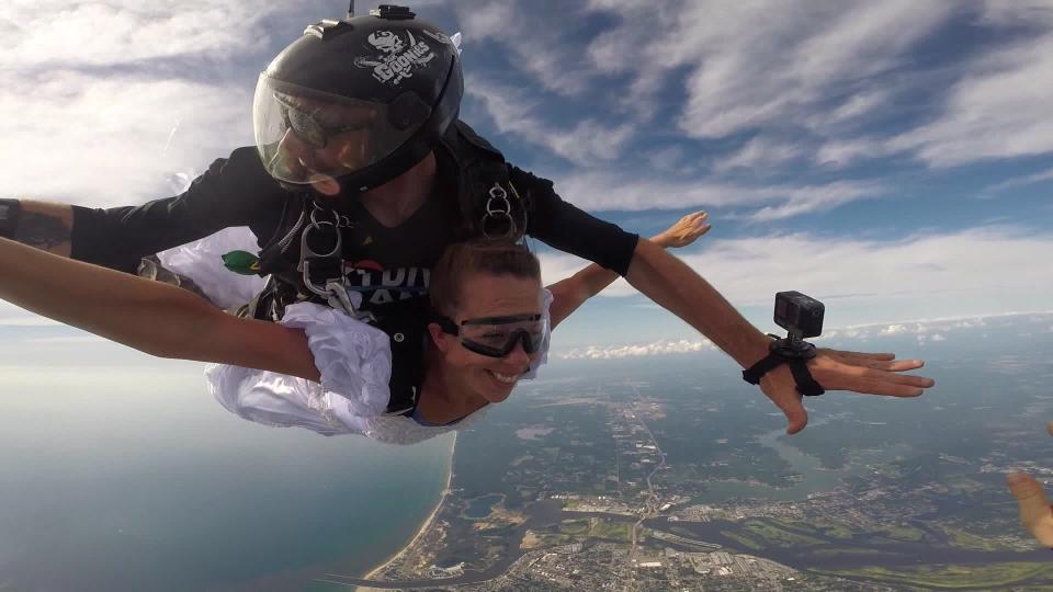 Teresa Verry celebrates her 20th wedding anniversary by skydiving her wedding dress.