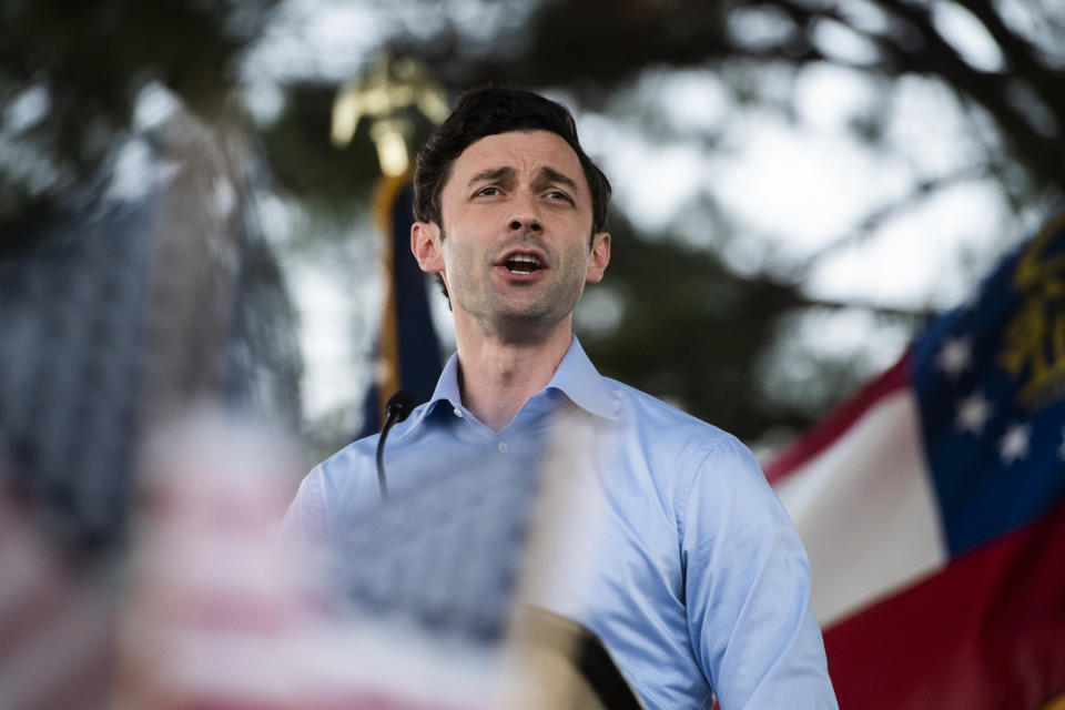 Jon Ossoff, Democratic candidate for U.S. senate, speaks during a drive-in rally in Columbus, Ga. (Tom Williams/CQ-Roll Call Inc. via Getty Images)