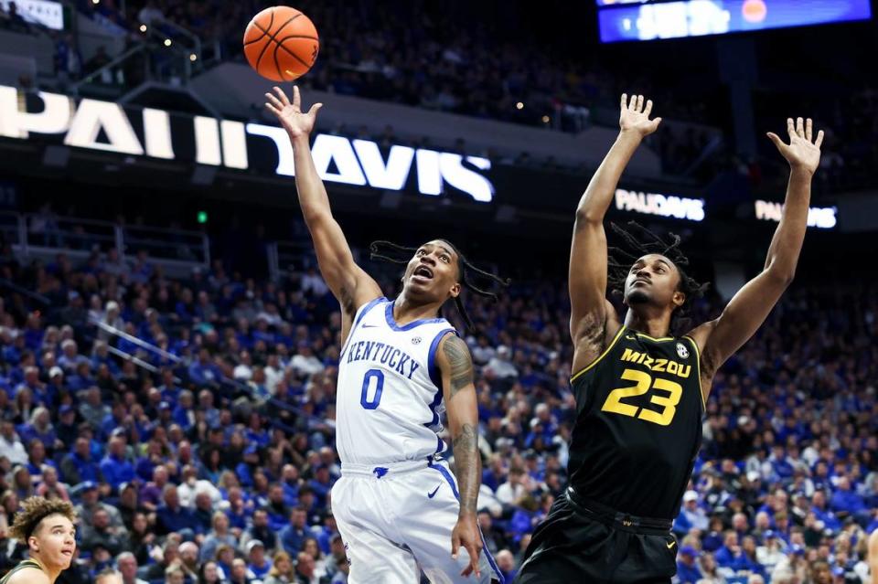 Kentucky’s Rob Dillingham (0) drives to the basket against Missouri’s Aidan Shaw (23) during the first half of Tuesday night’s Southeastern Conference matchup in Rupp Arena.