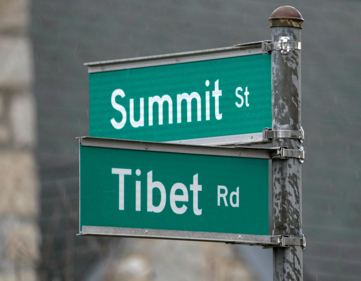 Visitors can “travel the world in Ohio” by visiting towns named after foreign metropolises like Athens, Berlin, Medina, Dublin, or Lima (all localized with Ohioans' unique pronunciations, of course). This sign for the intersection of Summit Street and Tibet Road is in Clintonville.