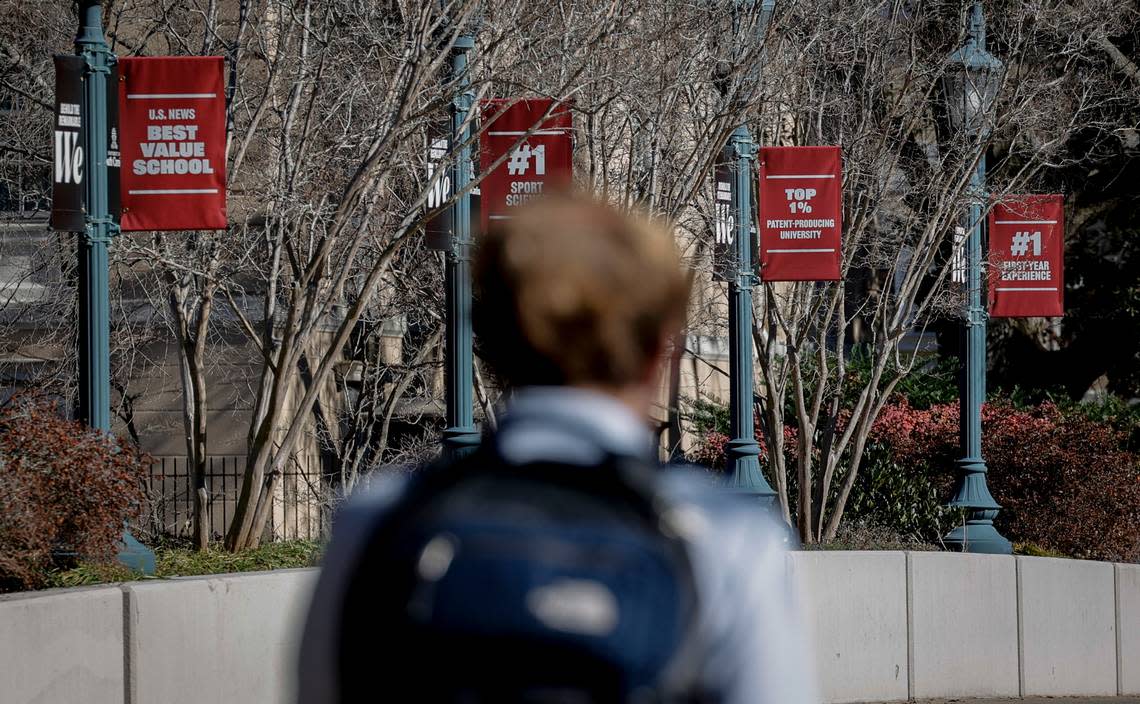 Students walk across campus at the University of South Carolina in Columbia.