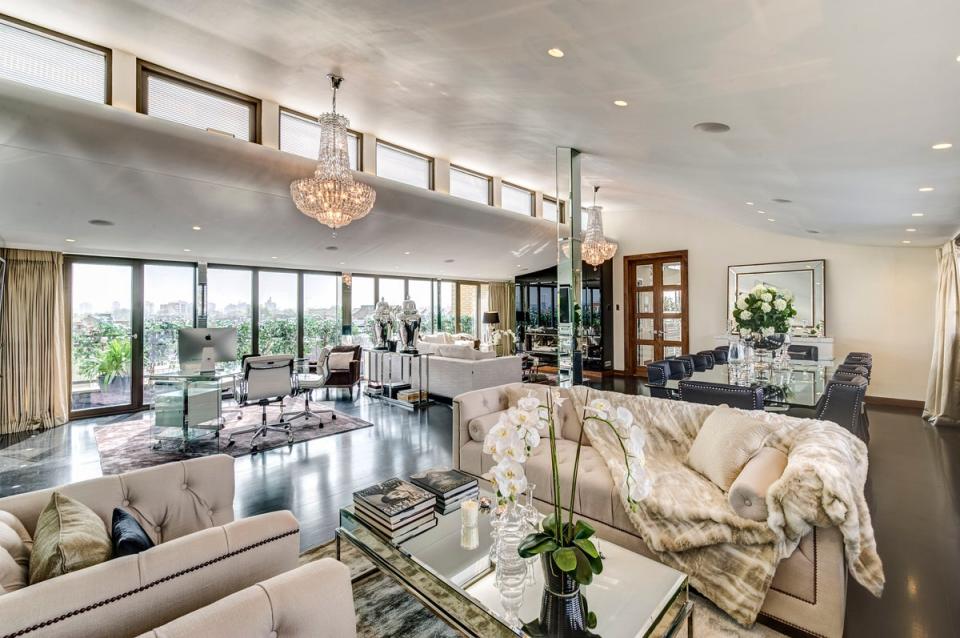 Plush: there is no shortage of seating in the luxurious main reception room of the penthouse (Berkshire Hathaway Homeservices London)