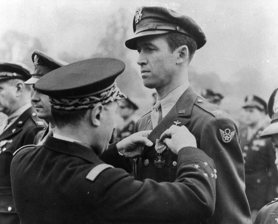 Lt. Gen. Valin, Chief of Staff, French Air Force, awards the Croix De Guerre with Palm to Col. Jimmy Stewart for exceptional services in the liberation. | U.S. Air Force