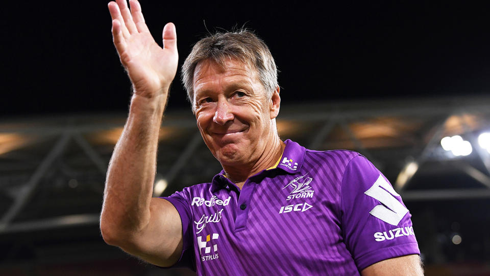 Melbourne Storm coach Craig Bellamy (pictured) waves to NRL fans.