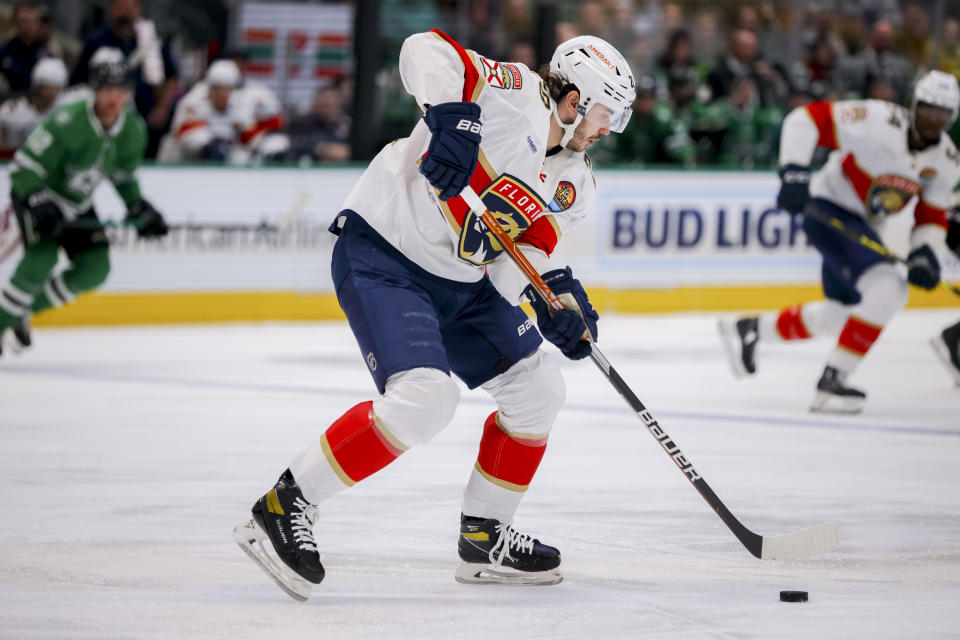 Florida Panthers defender Josh Mahura blocks a pass in the first period of an NHL hockey game against the Dallas Stars in Dallas, Sunday, Jan. 8, 2023. (AP Photo/Gareth Patterson)