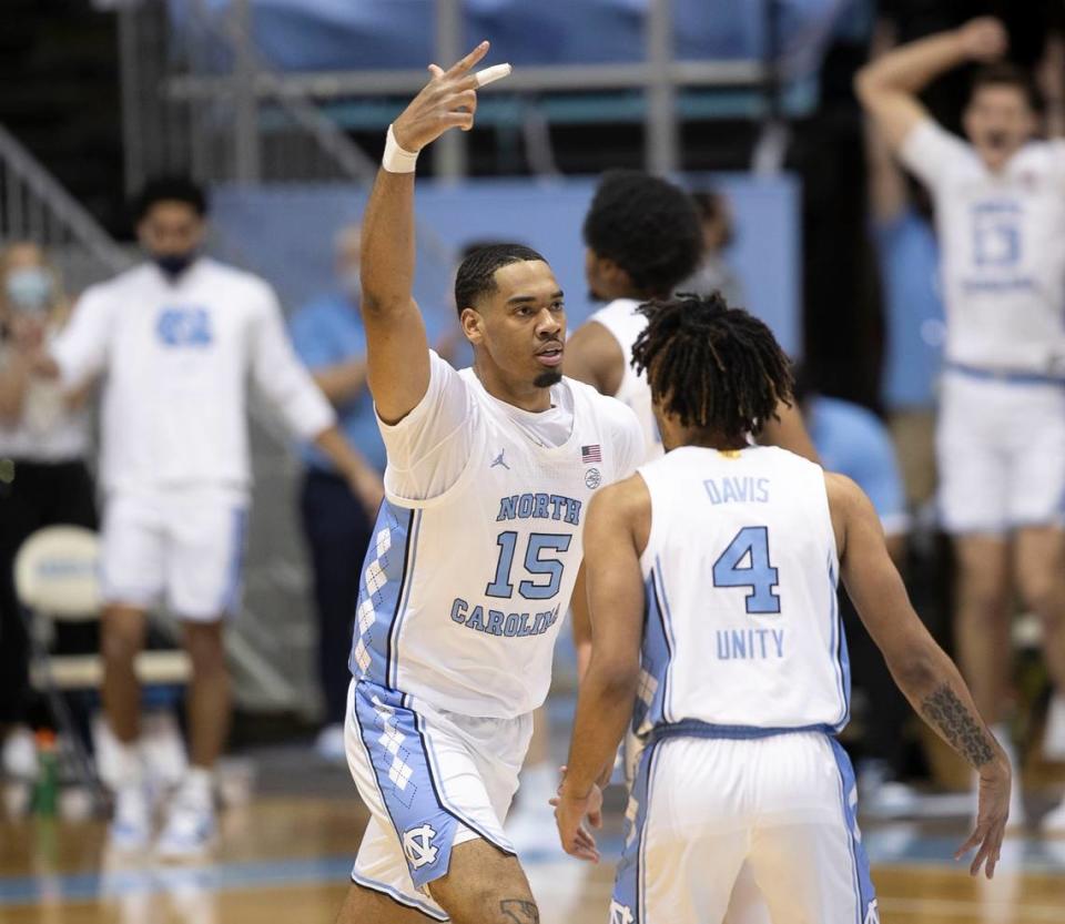 North Carolina’s Garrison Brooks (15) reacts after sinking a three-point basket during the second half against Duke on Saturday, March 6, 2021 at the Smith Center in Chapel Hill, N.C.