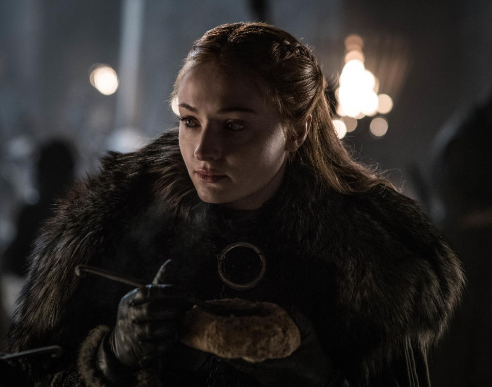 This image released by HBO shows Sophie Turner in a scene from "Game of Thrones," that aired Sunday, April 21, 2019. With the Game of Thrones' Jon Snow revealing his royal lineage to his potential rival Daenerys Targaryen, the beleaguered army at Winterfell is about to find out if two chief executives better than one. (Helen Sloan/HBO via AP)