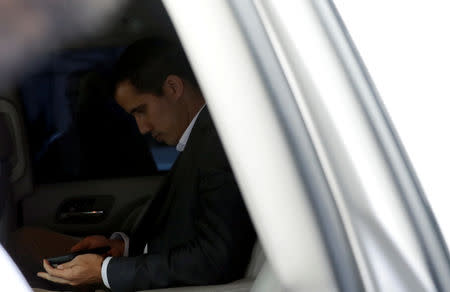 Venezuelan opposition leader Juan Guaido, who many nations have recognized as the country's rightful interim ruler, leaves after the meeting with public employees in Caracas, Venezuela March 5, 2019. REUTERS/Carlos Jasso