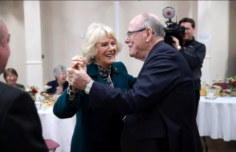 Arthur Edwards dancing with Camilla. Photo: Getty Images