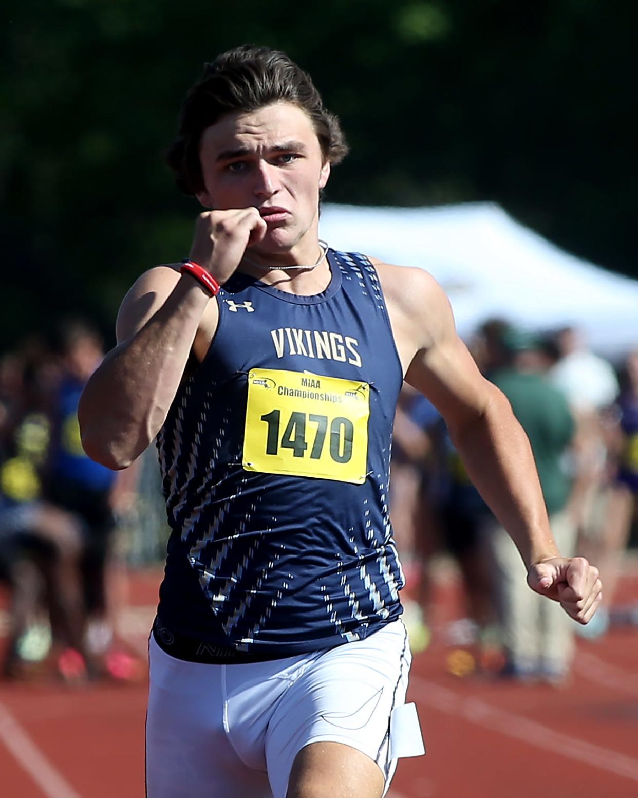 East Bridgewater’s Chris Oman sprints to the finish line in the 100 meter dash during the Division 5 state tournament at the Norwell Clipper Community Complex on Saturday, May 27, 2023.