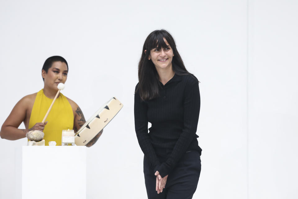 Designer Marie-Christine Statz accepts applause after the Gauchere Spring-Summer 2021 fashion collection, Wednesday, Sept. 30, 2020, during Paris fashion week. (Photo by Vianney Le Caer/Invision/AP)