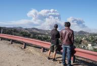 <p>Wildfires ripping through North and South California have lead to dozens of death and over 200 missing. Left behind are remnants of homes, cars, and creatures left to race the speed of the flames.<br>(Photos by Justin Sullivan/Getty Images) </p>