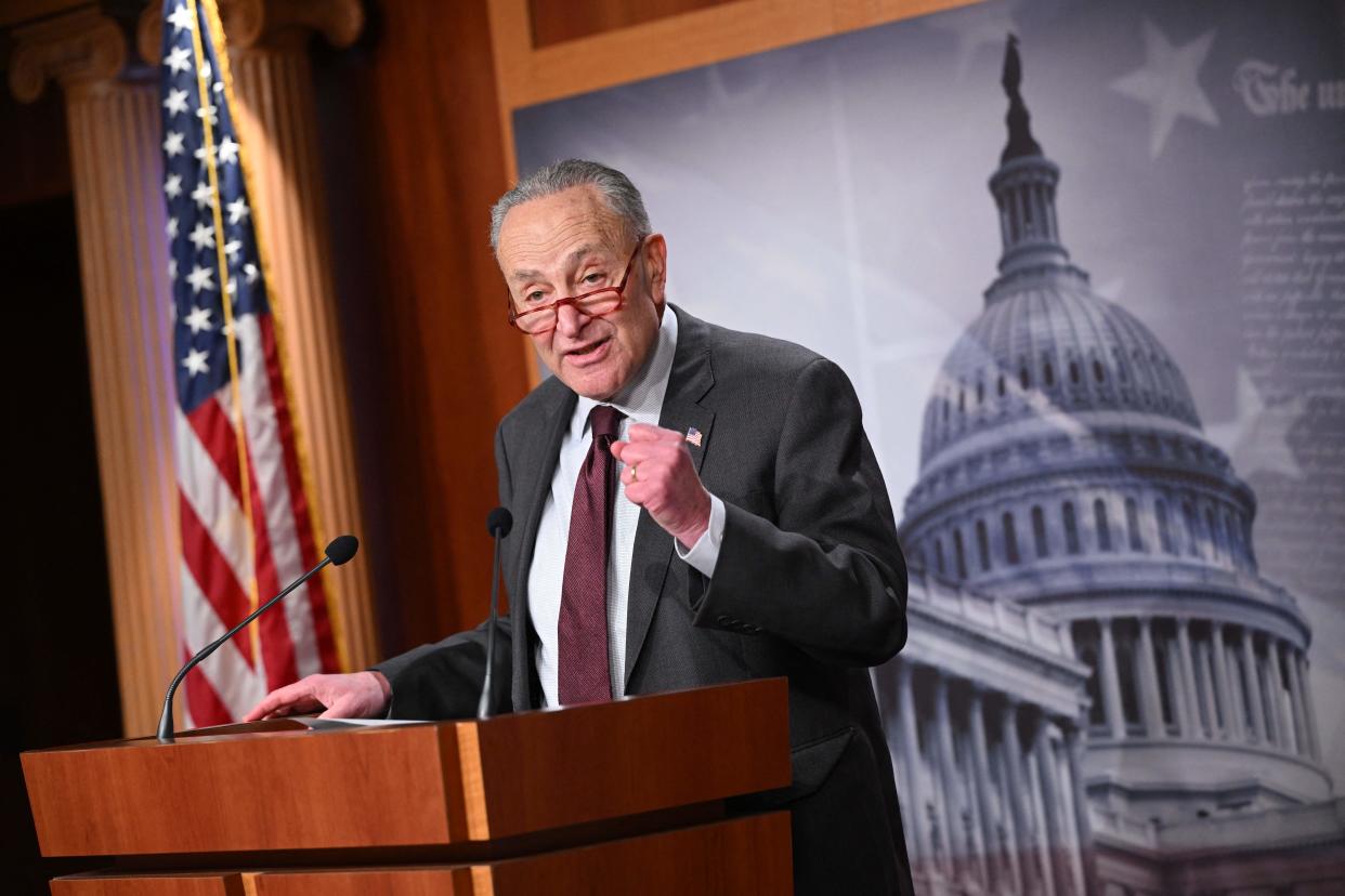 US Senate Majority Leader Chuck Schumer, Democrat of New York, speaks about the government spending bill, during a press conference in the Senate Studio of the US Capitol in Washington, DC on December 21, 2022. (Photo by Mandel NGAN / AFP) (Photo by MANDEL NGAN/AFP via Getty Images)