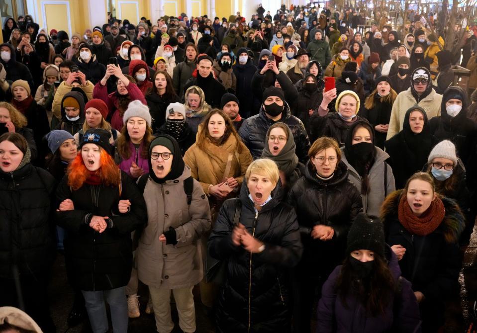 Demonstrators shout slogans in St. Petersburg, Russia, Friday, Feb. 25, 2022. Shocked Russians turned out by the thousands Thursday to decry their country's invasion of Ukraine as emotional calls for protests grew on social media. Some 1,745 people in 54 Russian cities were detained, at least 957 of them in Moscow.