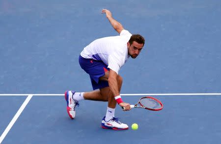 Marin Cilic of Croatia returns a shot to Mikhail Kukushkin of Kazakhstan on day five of the 2015 U.S. Open tennis tournament at USTA Billie Jean King National Tennis Center. Mandatory Credit: Jerry Lai-USA TODAY Sports