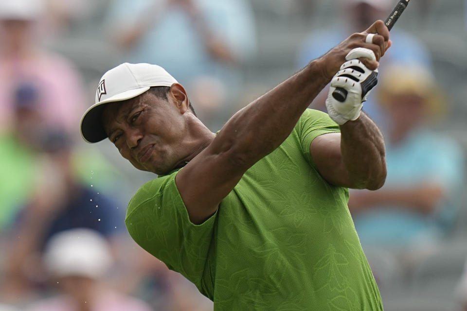 Tiger Woods watches his tee shot on the 10th hole during the second round of the PGA Championship golf tournament at Southern Hills Country Club, Friday, May 20, 2022, in Tulsa, Okla. (AP Photo/Eric Gay)
