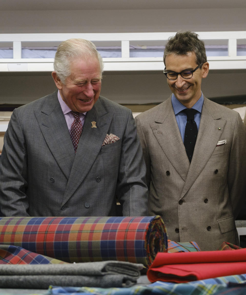 Prince Charles is pictured with Yoox Net-A-Porter chairman Federico Marchetti during a visit to Dumfries House in Ayrshire, Scotland. [Photo: Getty]