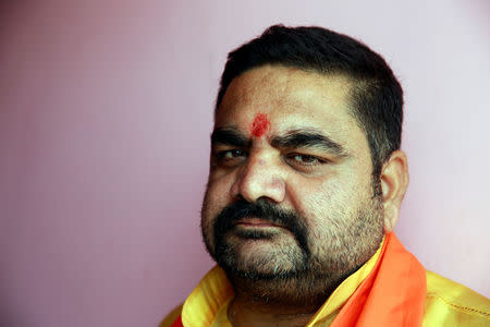 Pankaj Singh, senior leader of the Hindu Yuva Vahini vigilante group poses for a picture in the city of Unnao, India, April 5, 2017. Picture taken April 5, 2017. REUTERS/Cathal McNaughton