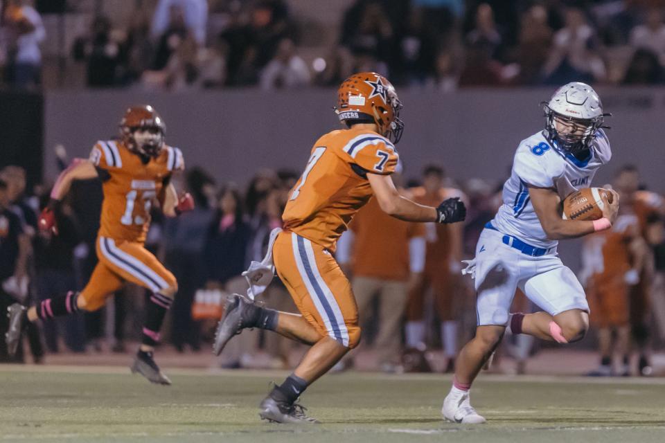 Riverside's Adrian Estrada (7) and Manuel Holguina (8) at a high school football game at Riverside High School on Friday, Oct. 29, 2021 in El Paso, Texas.