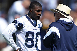 Jones talks to first-round pick Dez Bryant, who has been hampered with a high ankle sprain