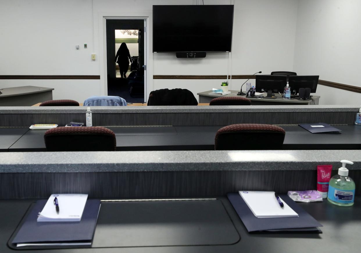 A courthouse employee makes their way into the grand jury room at the Summit County Courthouse on March 28,.