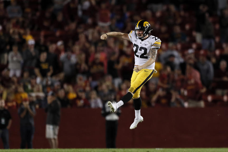 FILE - In this Sept. 14, 2019, file photo, Iowa punter Michael Sleep-Dalton celebrates at the end of an NCAA college football game against Iowa State, in Ames, Iowa. The Big Ten Conference knows the value of having good punters, and they are sometimes willing to go a long way to get them. Sleep-Dalton is a former Australian rules football player who trained at ProKick Australia before coming to the United States. (AP Photo/Charlie Neibergall, File)