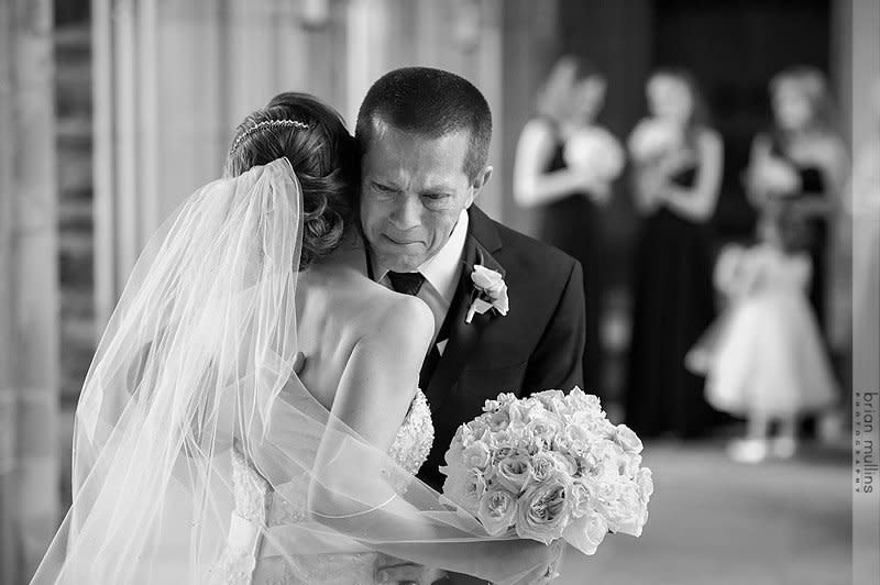 <p>"We think it's important&nbsp;to capture the first time the bride and groom see each other. However, as a father and photographer, this is the one photo that I MUST have: when the dad sees his daughter before the wedding." - Brian Mullins</p>