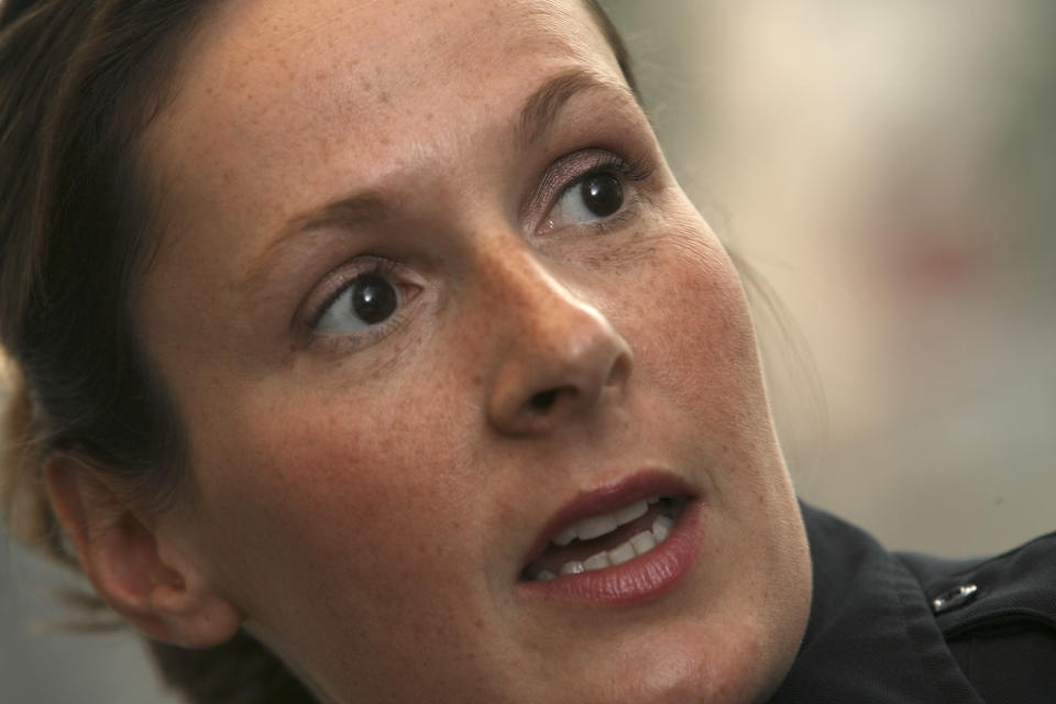 This May 31, 2007 photo shows Officer Kim Potter, part of the Brooklyn Center Police negotiation team in Brooklyn Center, Minn. Potter, who fatally shot Daunte Wright, a Black man, during a traffic stop on Sunday, April 11, 2021 in the Minneapolis suburb and the city’s chief of police have resigned. Brooklyn Center Mayor Mike Elliott says he hopes the moves will heal the community and lead to reconciliation after two nights of protests and unrest. (Bruce Bisping/Star Tribune via AP)