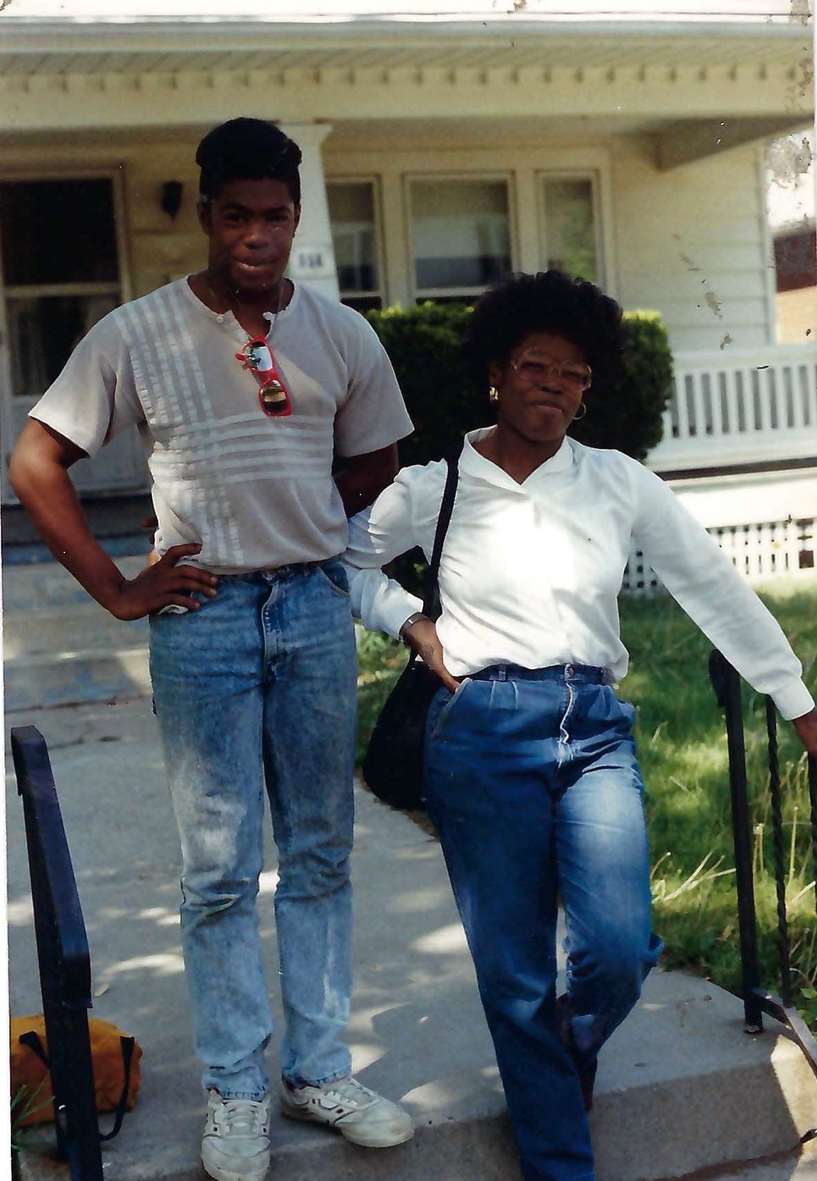 Denise Holcomb and her son, Derrick Cummings, right before he graduated high school. Derrick died by suicide at age 30 in August 2003.