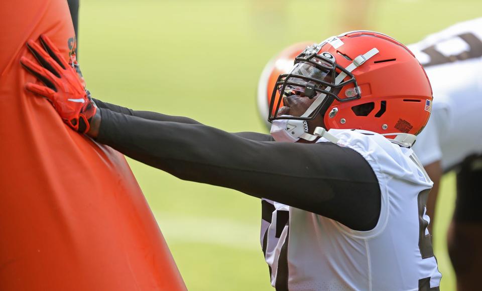 Cleveland Browns defensive tackle Perrion Winfrey participates in drills during the NFL football team's rookie minicamp in Berea on Friday.
