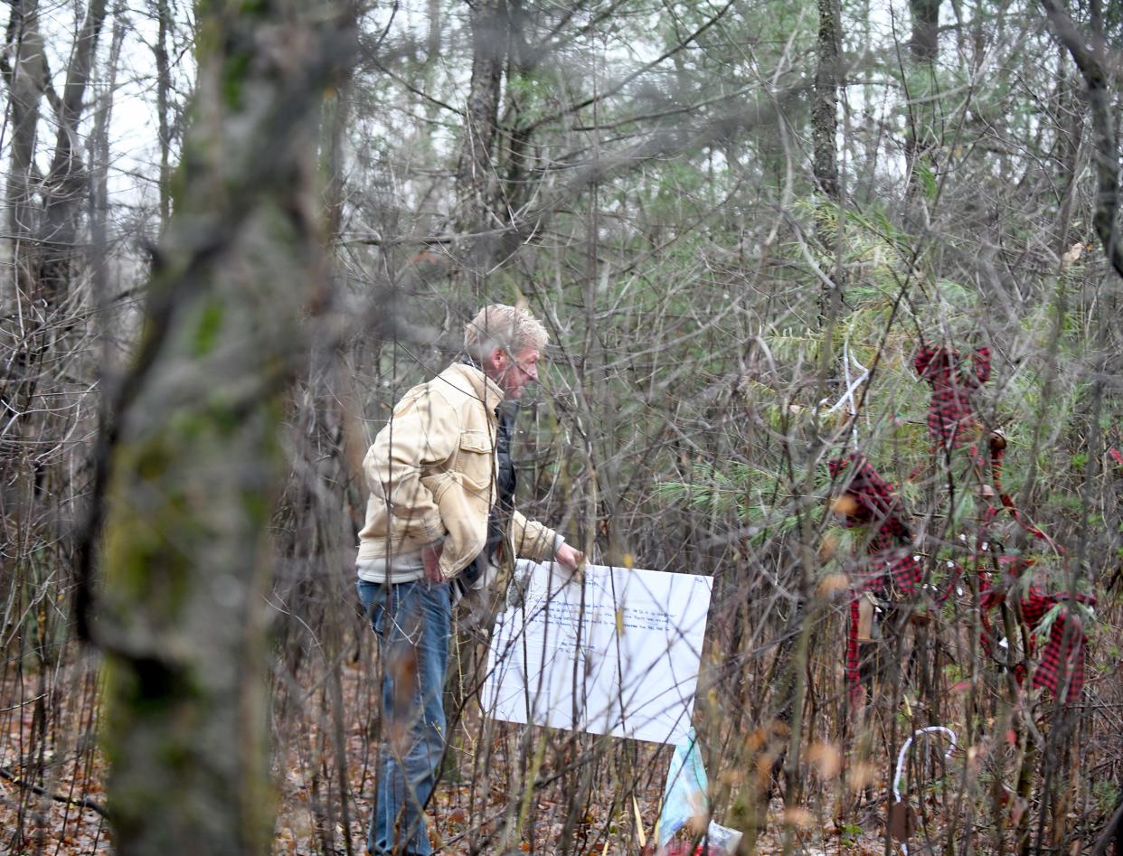 Michael and Amy Catlin Wozniak decorate a tree in Quail Hollow Park in Lake Township each year in memory of Ryan Wozniak who died in 2014.