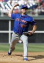 New York Mets pitcher Corey Oswalt throws during the first inning of a baseball game against the Philadelphia Phillies, Thursday, Aug. 16, 2018 in Philadelphia. (AP Photo/Tom Mihalek)