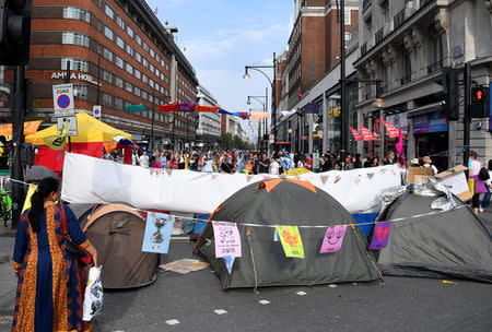 Tents are seen in the road during the Extinction Rebellion protest on Oxford Street, near Marble Arch in London, Britain, April 22, 2019. REUTERS/Toby Melville