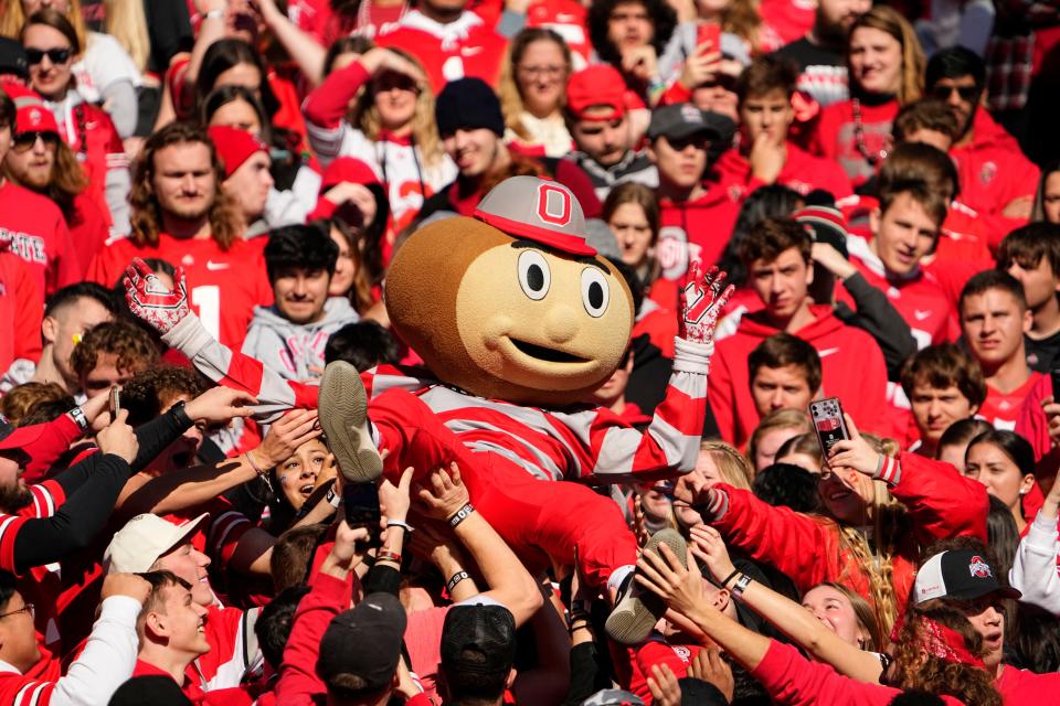 Brutus Buckeye surfs the crowd during the Ohio State-Michigan game Nov. 22. He'll be back on New Year's Eve.