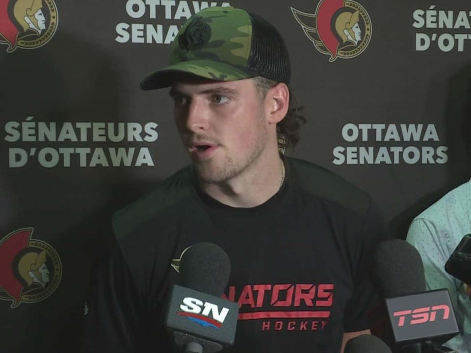 Drake Batherson talks to reporters at Ottawa Senators training camp on Thursday, the first day of on-ice activity. (Jonathan Jobin/Radio-Canada - image credit)